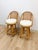 This pair of vintage rattan swivel counter height barstools brings a breezy, Hollywood Regency sensibility to any bar or...