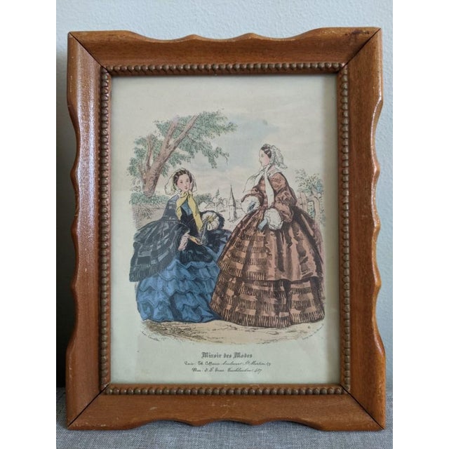 These is a set of 2 French fashion prints by the artist Anais Toudourine in original wooden frames and great condition....
