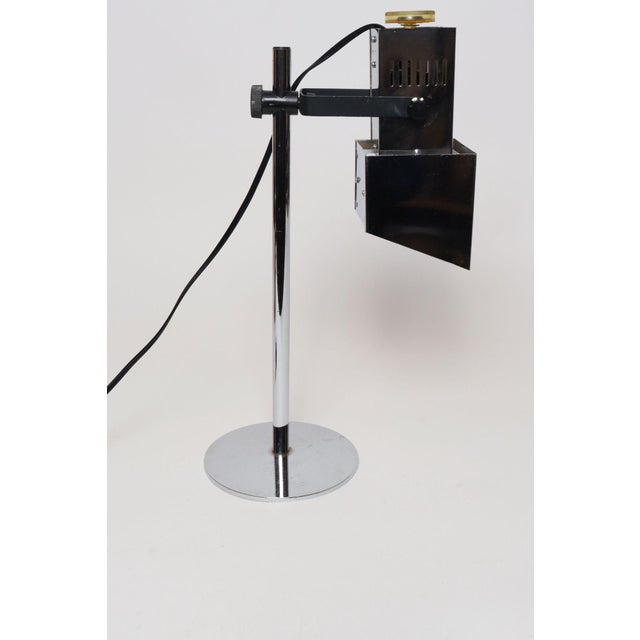 Vintage Koch & Lowy Chrome stage or spotlight-style task/table lamp (ca. 1970s, USA). Featuring a geometric-form...