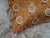 Kiku in autumn copper. The chrysanthemum — the queen of flowers — set in floating medallions across burnished copper silk,...