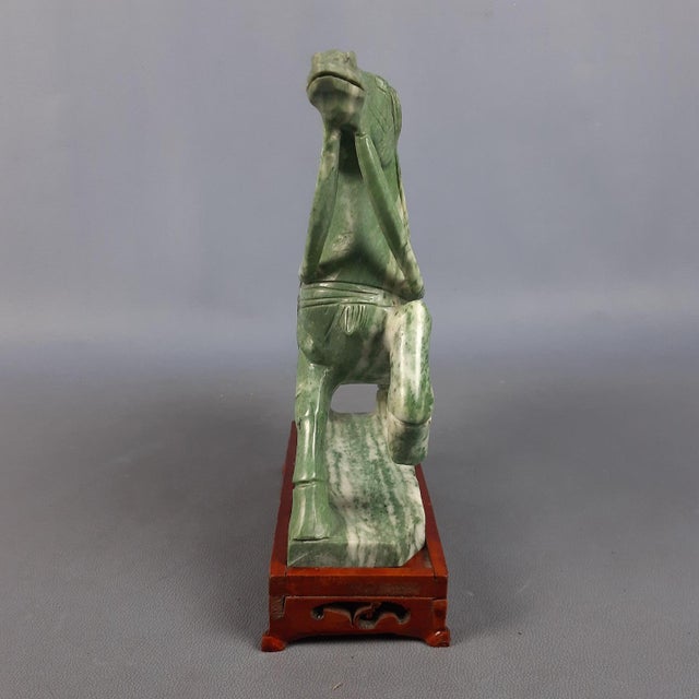 A stunning vintage Chinese sculpture of a horse, attributed to fine 20th-century Oriental craftsmanship, complete with its...