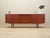 The sideboard was made in the 1960s, produced by the well-known Danish manufactory Clausen & Søn. The structure is covered...