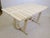 Folding garden table "Riviera" by Triconfort, made entirely of wood with a slatted tabletop in a simple, minimalist...
