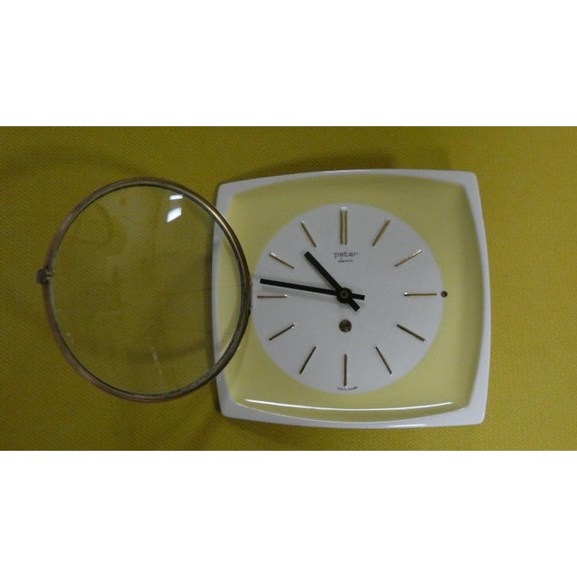 7-jewel ceramic wall clock, produced by the historic peter electric brand. Mid-century/space age style, featuring a...