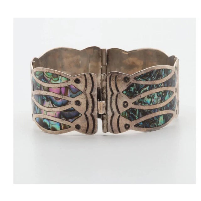 This is part of Chairish’s Costume Jewelry assortment. A beautiful unique circa 1940 Mexican Modernist Artisan Hand-...