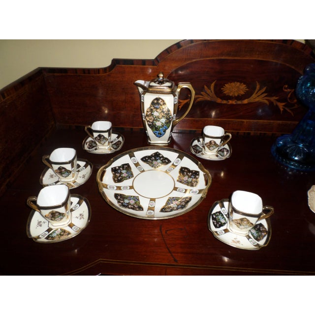 This is a Antique Art Deco Gorgeous Hand Painted Chocolate Pot Set with 5 Matching Cups and Saucers and a Master Cake...