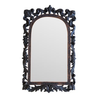 Early 20th Spanish Black Forest Carved Mirror with Floral Motif For Sale