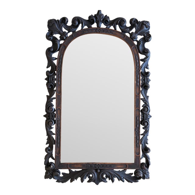 Early 20th Spanish Black Forest Carved Mirror with Floral Motif For Sale