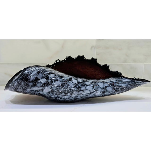 Dramatic hand‑blown Polish art glass conch shell centerpiece, attributed to Jozefina of Krosno, Poland. This substantial...