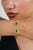 This open cuff bangle bracelet features 2.58 carats of pear-shaped emeralds, Crafted in 14K yellow gold. Each emerald...