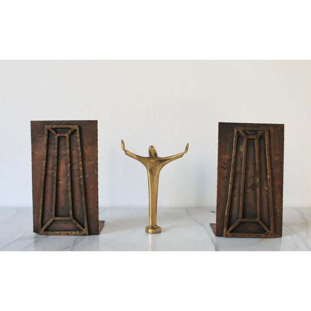 Pair of mid-century modernist copper bookends. No makers mark. Some age wear. Pictured.