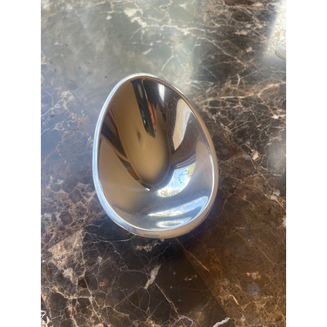 Nambe Metal Alloy Decorative Bowls. Set of two. one small egg-shaped: 2 inches tall / 5.5 inches wide / 4 inches deep one...