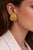 A striking pair of 18 karat yellow gold sculptural earrings by celebrated British designer Elizabeth Gage. Crafted in...