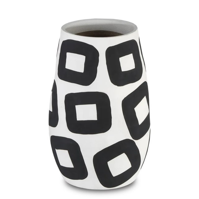 The Pagliacci Large Vase is made of the finest porcelain in a dynamic matte white finish onto which black contemporized...