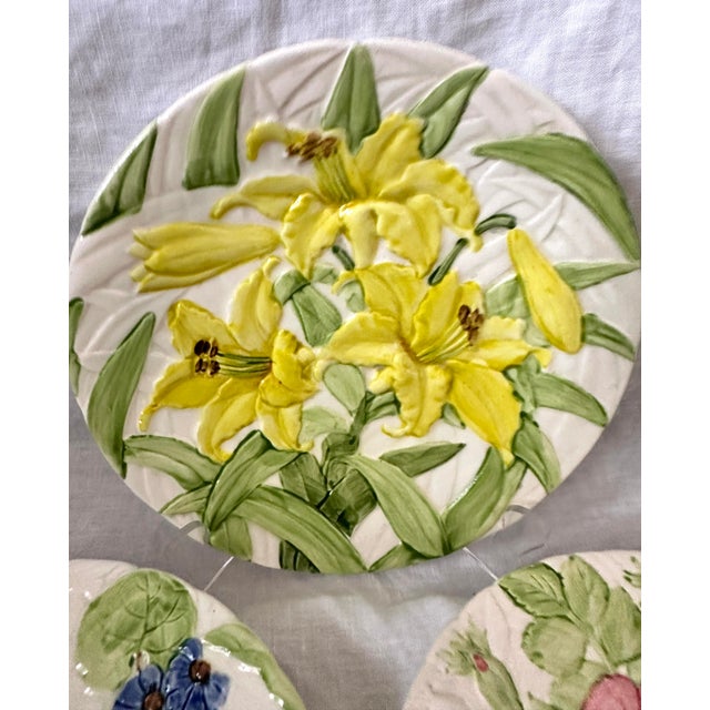 Set of 4 "Fleurs du Jour " by Shafford raised relief floral plates. Super cute for a lunch get together. Also would great...