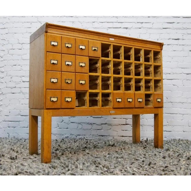 A unique, antique index/library/pharmacy cabinet / chest of drawers, made in Germany, during the 1940 or 1941 period of...