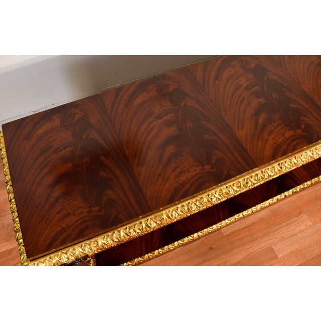 We are pleased to offer this beautiful French Empire Console table, from the 1930s. This console is made of Crotch...
