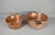 Pair French Antique Copper Cauldrons An attractive pair of Copper Cauldrons featuring forged steel handles with copper...