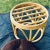 Round bent bamboo rattan footstool with flippable seat cushion. Ships quickly via FedEx Home Delivery!