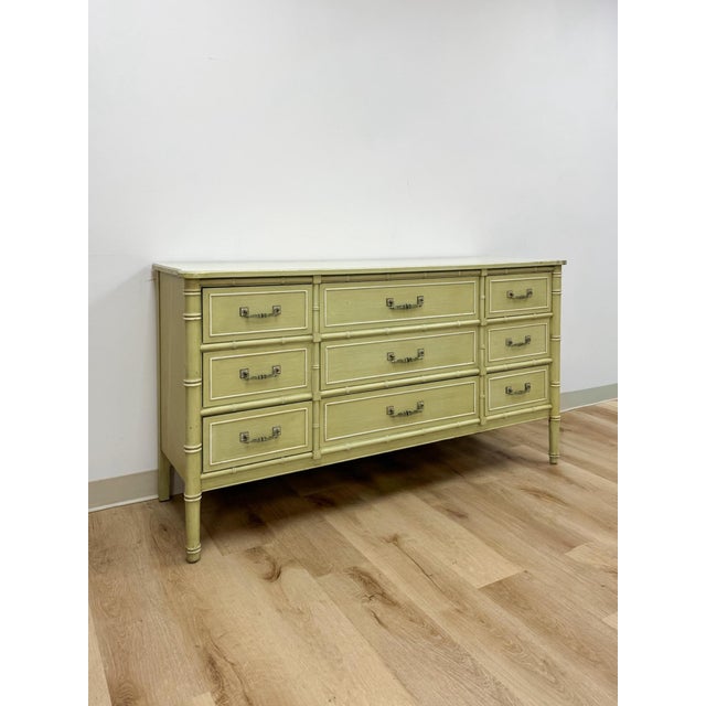 This gorgeous vintage Henry Link green nine drawer dresser is a highly collectible and sought after coastal and Hollywood...