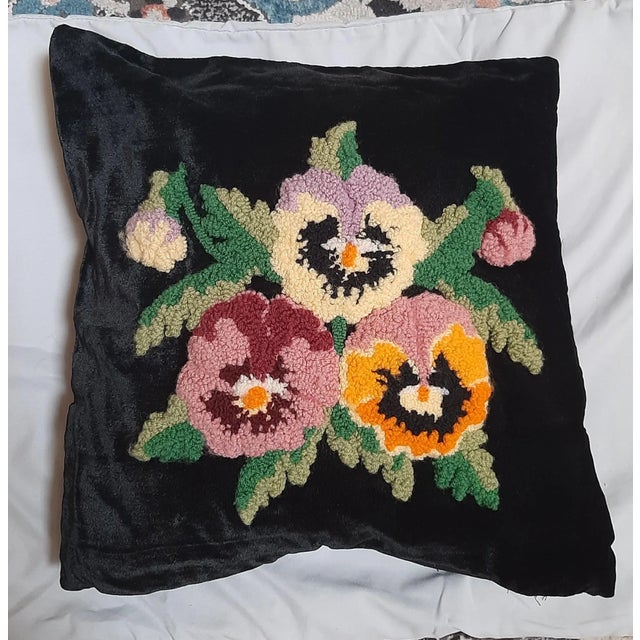Gorgeous punch needle cover in black velvet featuring a pansy floral design. It showcases lovely colors of green, purple,...