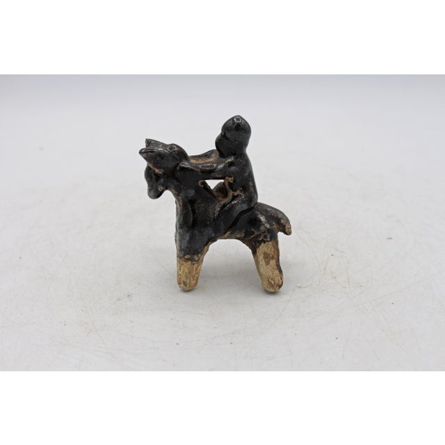 Miniature Tang Dynasty stoneware figure of a horse & rider, 618-907 CE. Typical of the Xi'an region of Shaanxi province....