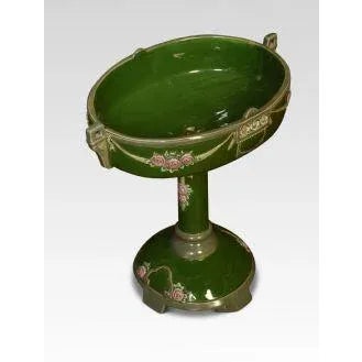 Eichwald Art Nouveau glazed centrepiece, with moulded swags on a green ground. Dimensions Height 11.5 Inches Width 11...
