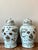 Make a stately and sophisticated statement with this exceptional pair of large, vintage ceramic temple jars. Crafted in...