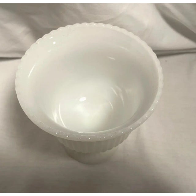 Bring classic Mid-Century charm to your home with this Vintage MCM E.O. Brody & Co. Milk Glass Ribbed Pedestal Planter....