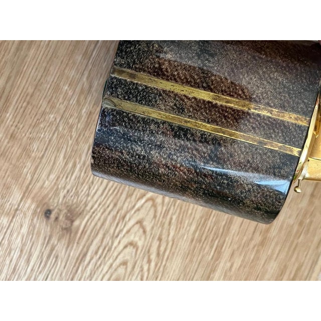 Ashtray and Lighter in Goatskin Veneer with Brass Elements by Aldo Tura, Set of 2 This piece has an attribution mark, I am...