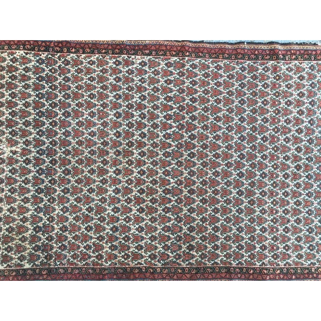 Late 19th century Kurdish rug with a decorative Botteh design and beautiful natural colors with red, yellow, blue and...