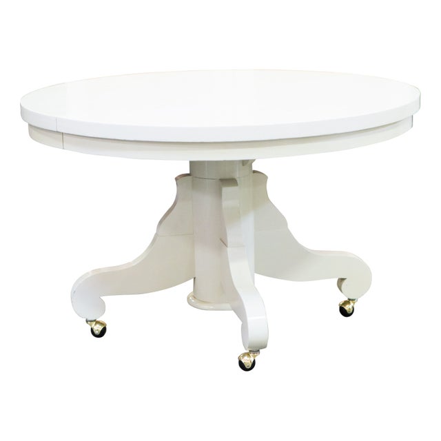 Orson Lacquered Pedestal Table on Casters Chairish