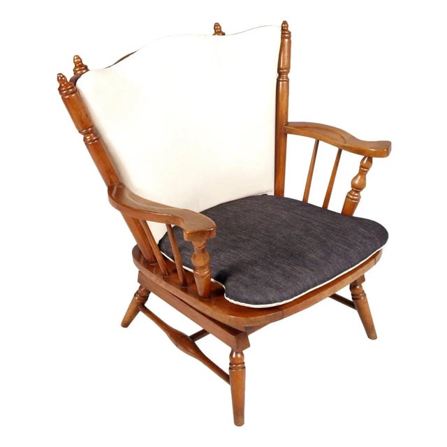 This pair of sturdy Chiavari chestnut rocking chairs with springs was produced in the 1930s and has since been reupholstered.