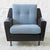 Wooden structure upholstered in black scaffold, seat and backrest reupholstered in sea blue chenille; black metal legs....