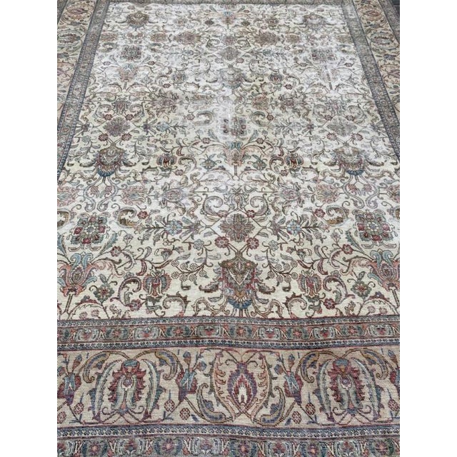 Vintage 1930's Tabriz in great size in decorative colors suitable for any room.