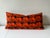 Hand Dyed Elephant Block Print Lumbar Pillow in a dark navy and vibrant orange. Cotton cover with zipper and down filled...