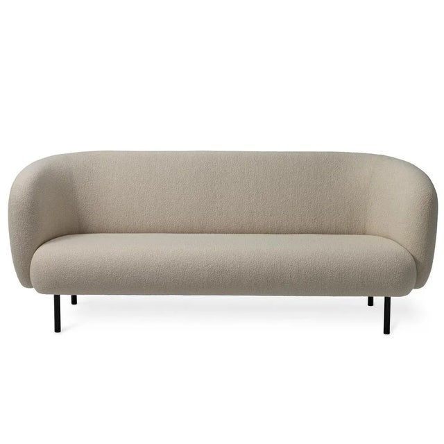 Caper 3 seater Sand by Warm Nordic Dimensions: D206 x W84 x H 63 cm Material: textile upholstery, wooden frame, powder...