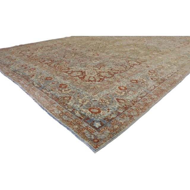 53389 Antique Persian Mashhad Rug Hotel Lobby Size Carpet 10'11 x 17'08. With a timeless botanical pattern and lovingly...