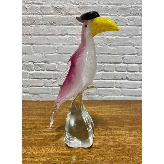 Hand blown Murano glass toucan sculpture, a refined example of traditional Italian glassmaking. Crafted in rich tones of...