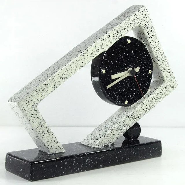 A highly decorative, postmodern table clock made of glazed ceramic. It comes from Italy from the Nove ceramics factory in...