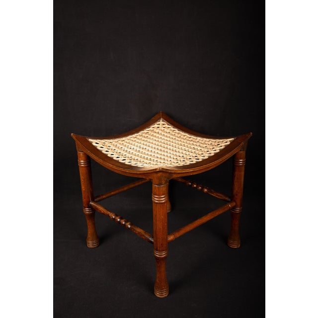 Wood and cord Thebes stool, 19th C Measures: 14.5" x 14.5" x 14.5".