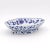 A Chinese-style narcissus bulb bowl. Typical lozenge shape with foot decorated with blue and white scrolls. Probably a...
