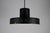 Italian mid-century pendant lamp attributed to stilnovo from the 1960s, featuring a striking combination of black...