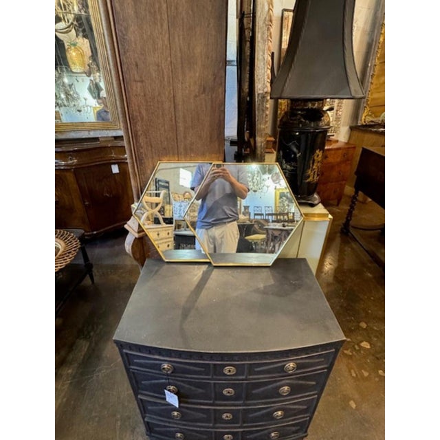 This product is a pair of Italian hex brass mirrors, perfect for adding a touch of elegance and sophistication to any home...