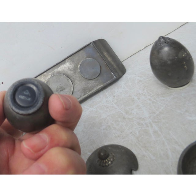 Danish designed set by Just Andersen in pewter from the '30s. Salt, pepper, and sugar pot with a lid on a fitted serving...