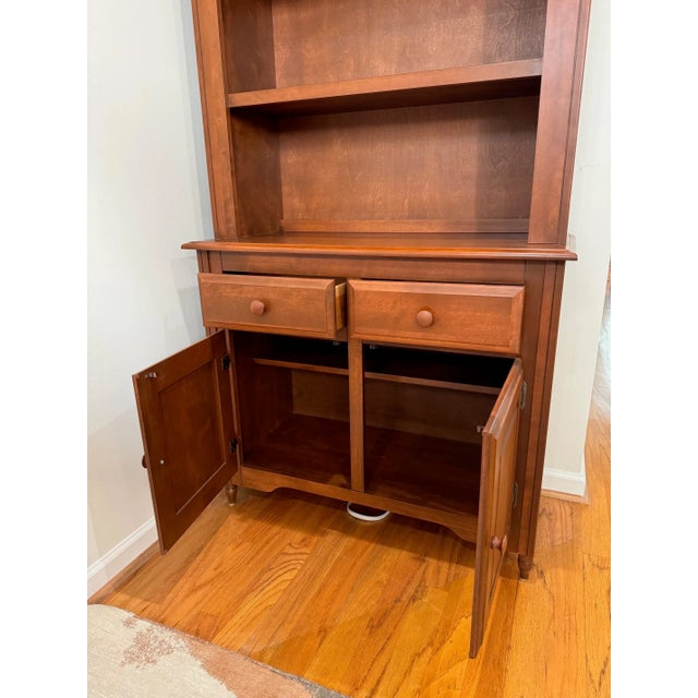 It's a very solid maple wood kitchen armoire, made by Canadel. It's very well made and the condition is excellent. The top...