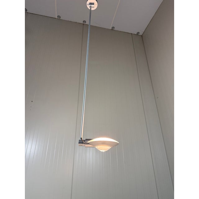Occhio Puro ceiling lamp by Axel Meise for Axelmeiselicht, Germany (marked). Matted aluminium, shade with at one side a...