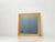 A timeless wall mirror in the clean, minimalist style of the 1960s. The wide frame, crafted from light-grained maple,...