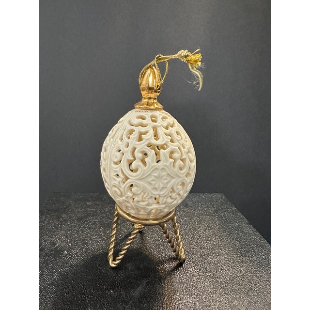 I used this egg year round...not just at Christmas. The artistry is gorgeous! Stand not included. Hang it from a tree, put...