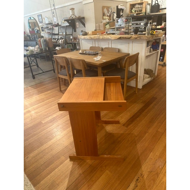 Mid Century Modern Teak compact desk. Scandinavian style teak wood compact typing style features clean architectural lines.
